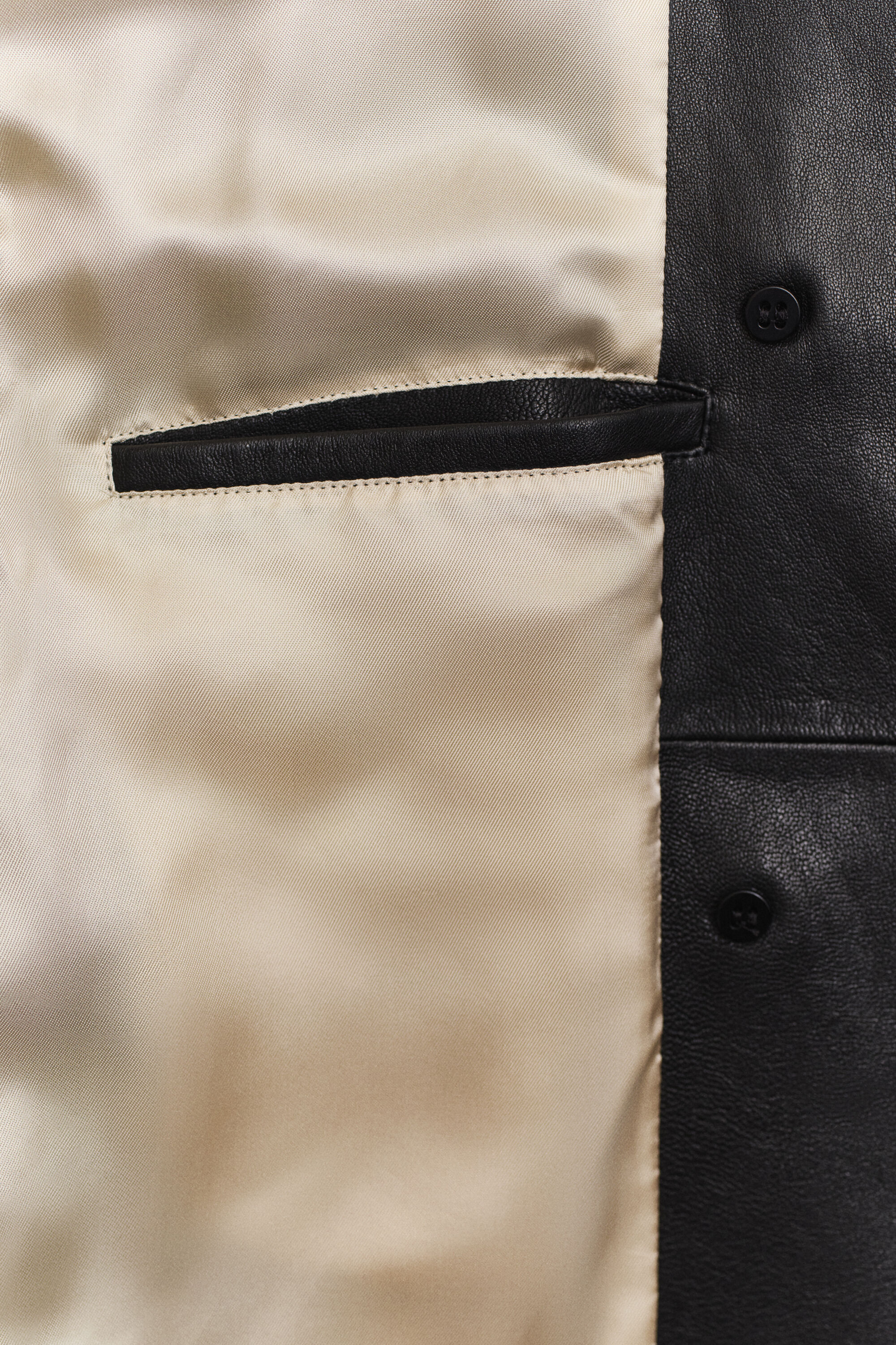 Kort trenchcoat i læder