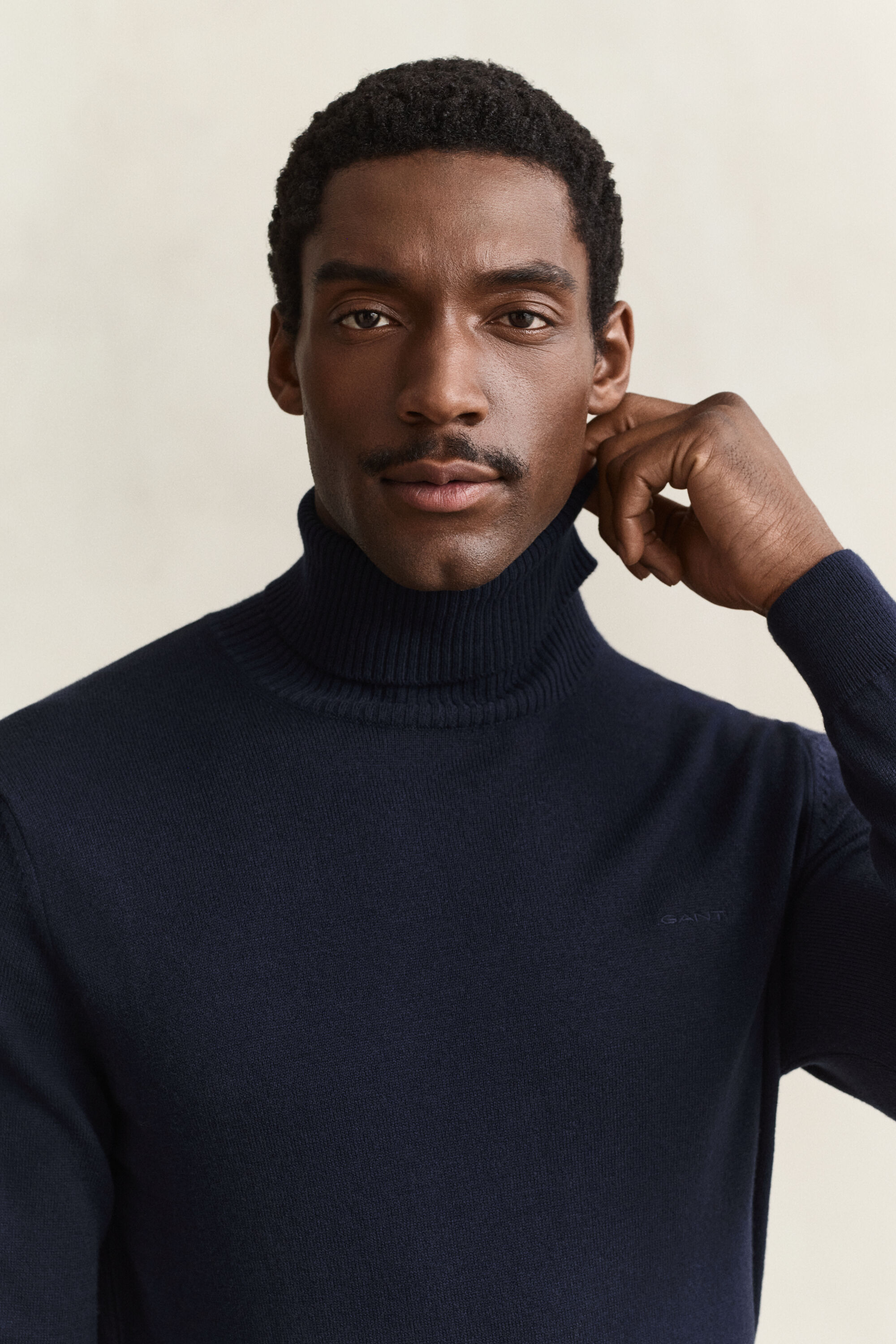 Sweater i bomuld og uld med rullekrave