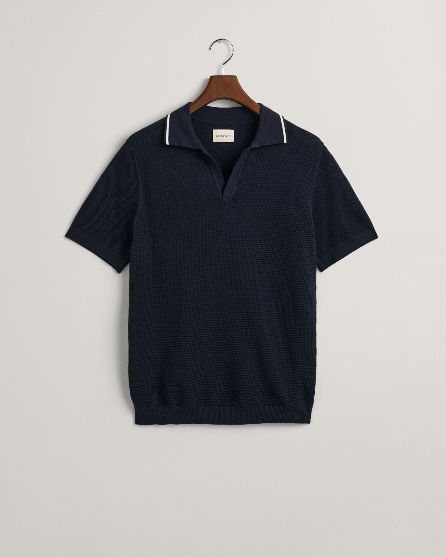 Tekstureret polosweater af bomuld med åben krave