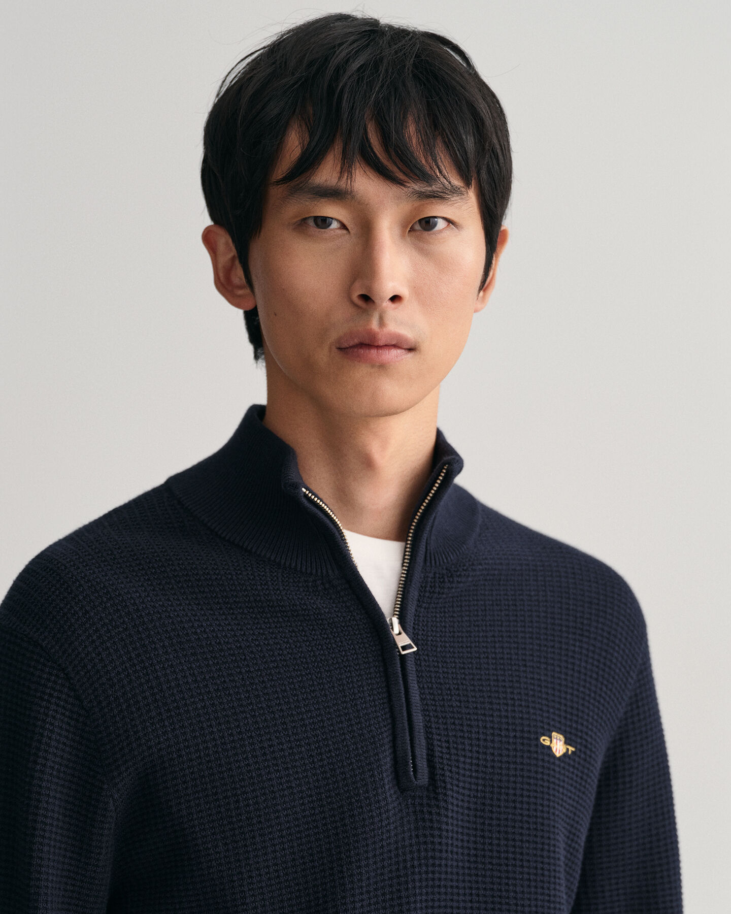 Tekstureret sweater af bomuld med halv lynlås